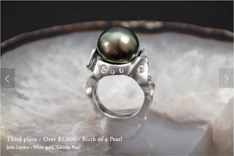 Tahitian black pearl ring standing on crystal