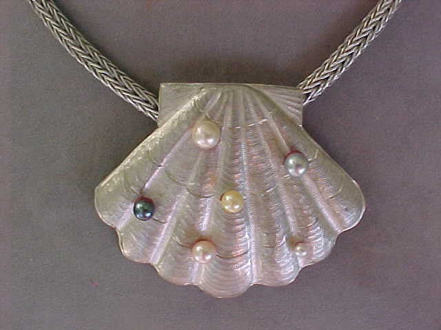 Chased silver shell pendant with cultured pearls + handmade chain